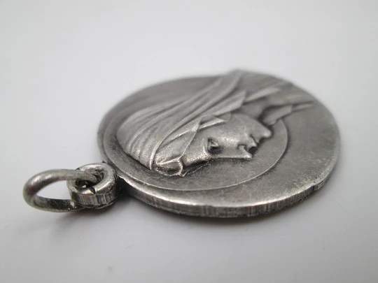 Virgin of Lourdes medal. Sterling silver. High relief. Escudero artist. 1950's. Europe