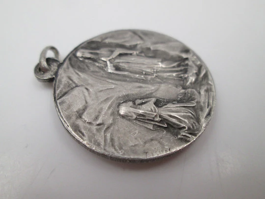 Virgin of Lourdes medal. Sterling silver. High relief. Escudero artist. 1950's. Europe