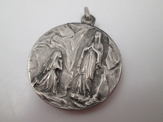 Virgin of Lourdes medal. Sterling silver. High relief. Escudero artist. 1950's. Europe