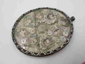 Virgin of the Patrocinio (Sevilla) oval reliquary. Sterling silver. 1870's. Spain
