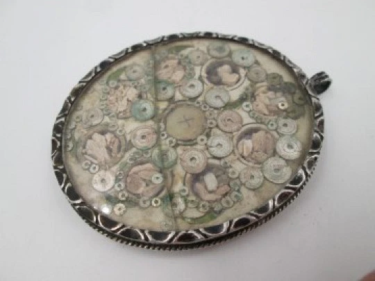 Virgin of the Patrocinio (Sevilla) oval reliquary. Sterling silver. 1870's. Spain