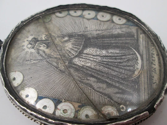 Virgin of the Patrocinio (Sevilla) oval reliquary. Sterling silver. 1870's. Spain
