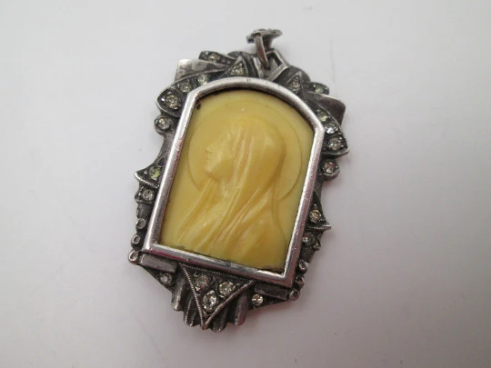 Virgin pendant medal. Sterling silver and white sapphires. Ivory carving. Spain. 1950's