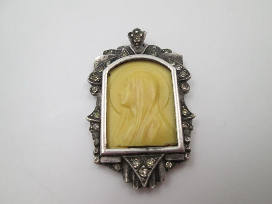 Virgin pendant medal. Sterling silver and white sapphires. Ivory carving. Spain. 1950's