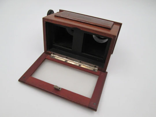 Visor estereoscópico de mano JCA 'Stereoskop'. Caja diapositivas vidrio. 1935