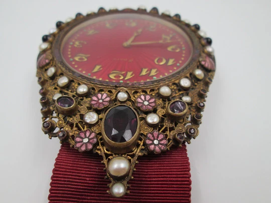 Wall clock Schild & Co. Bronze, amethysts, pearls and enamels. 1900's