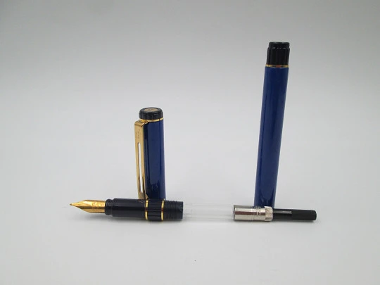 Waterman Centurion. Laca azul y morada. Detalles chapados oro. Estuche. 1990