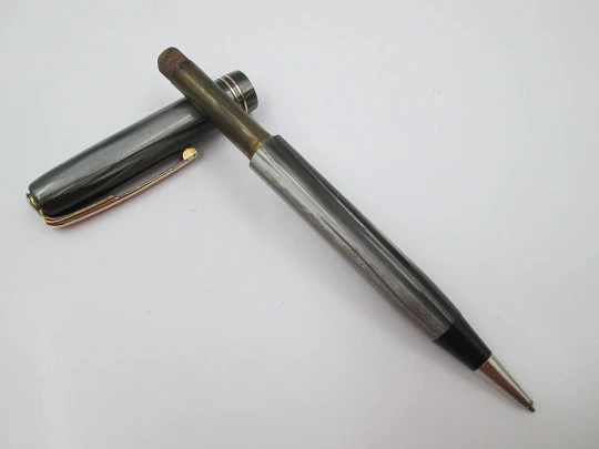 Waterman's mechanical pencil. Marble celluloid & gold plated. Twist system. Canada