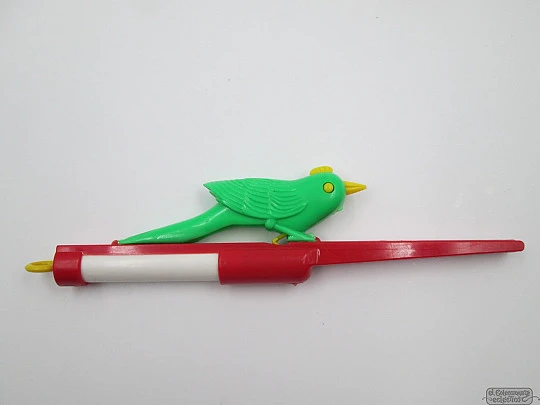 Whistling canary bird toy. Colours plastic. Spain. 1970's