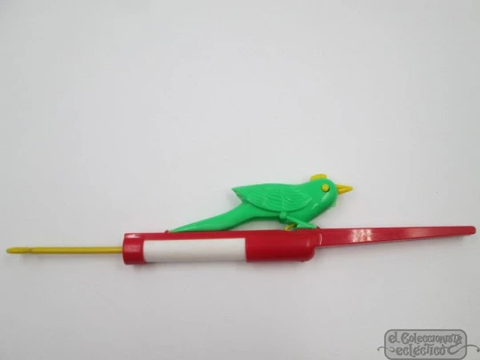 Whistling canary bird toy. Colours plastic. Spain. 1970's