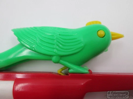 Whistling canary bird toy. Colours plastic. Spain. 1970's