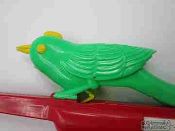 Whistling canary bird toy. Colours plastic. Spain. 1970's