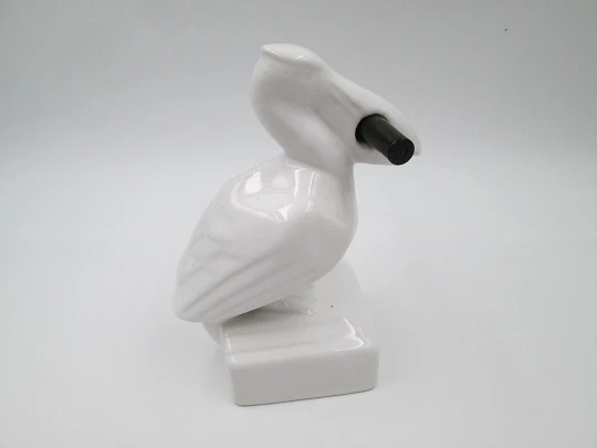 White ceramic Pelikan pen stand. Pelican shape. Gold lettering. 1990's. Germany