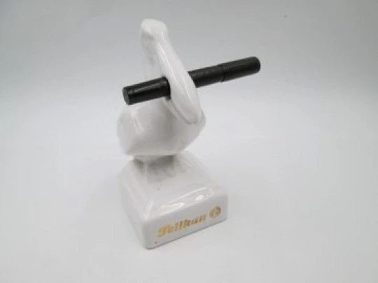 White ceramic Pelikan pen stand. Pelican shape. Gold lettering. 1990's. Germany
