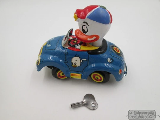 Wind-up toy car. Lithographed tinplate. Geyper / Disney. 1965