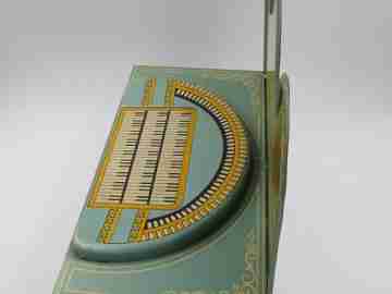 Wolverine crank organ toy. Lithographed tinplate. USA. 1950's