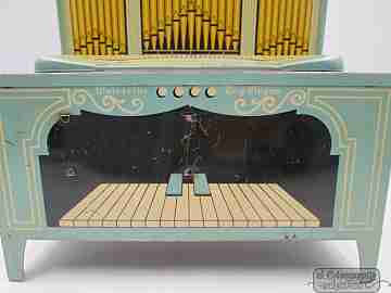 Wolverine crank organ toy. Lithographed tinplate. USA. 1950's