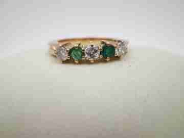 Women's alliance. 18 karat yellow gold, emeralds and diamonds. 2010. Europe