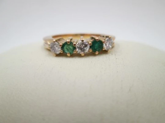 Women's alliance. 18 karat yellow gold, emeralds and diamonds. 2010. Europe