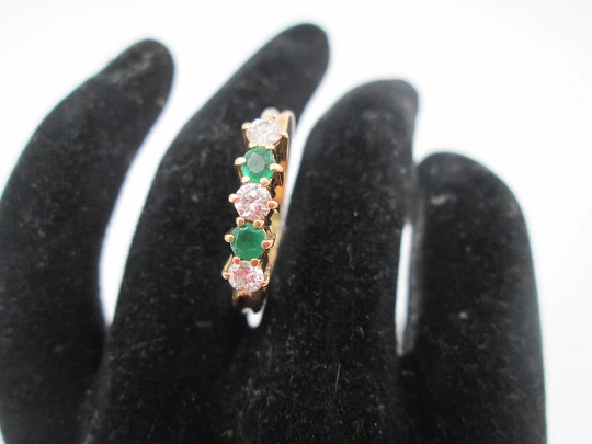 Women's alliance. 18 karat yellow gold, emeralds and diamonds. 2010. Europe