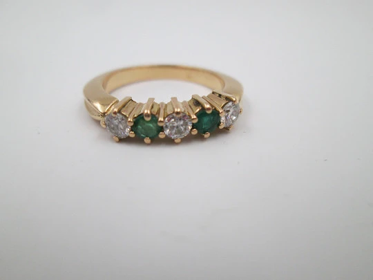 Women's alliance. 18 karat yellow gold, emeralds and diamonds. 2010. Europe