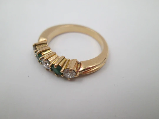 Women's alliance. 18 karat yellow gold, emeralds and diamonds. 2010. Europe