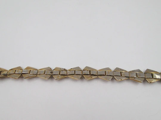 Women's art deco bracelet. Gold plated metal. Articulated design. Clamp clasp. 1940's Women's art deco bracelet. Gold plated metal. Articulated design. Clamp clasp. 1940's