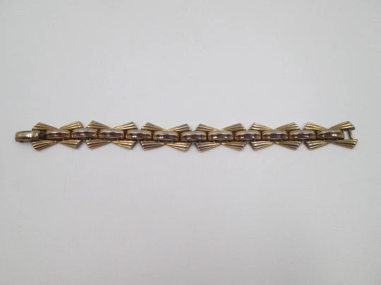 Women's art deco bracelet. Gold plated metal. Articulated design. Clamp clasp. 1940's Women's art deco bracelet. Gold plated metal. Articulated design. Clamp clasp. 1940's
