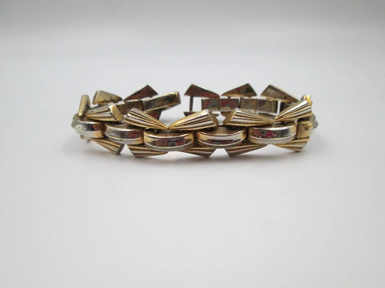 Women's art deco bracelet. Gold plated metal. Articulated design. Clamp clasp. 1940's Women's art deco bracelet. Gold plated metal. Articulated design. Clamp clasp. 1940's