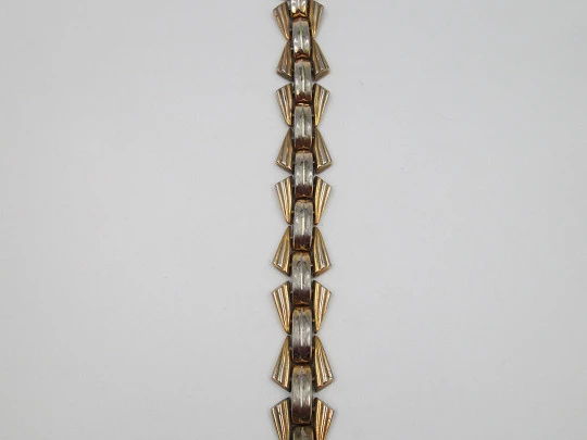 Women's art deco bracelet. Gold plated metal. Articulated design. Clamp clasp. 1940's Women's art deco bracelet. Gold plated metal. Articulated design. Clamp clasp. 1940's
