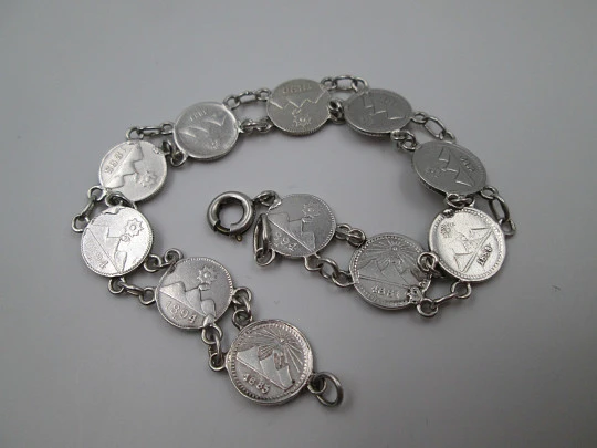 Women's articulated bracelet. 835 sterling silver. Guatemala 1/4 real coins. 1890's