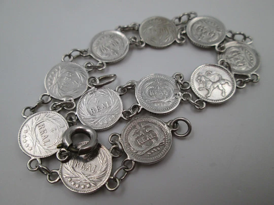 Women's articulated bracelet. 835 sterling silver. Guatemala 1/4 real coins. 1890's