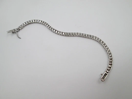 Women's articulated bracelet. 925 sterling silver and zircons. Tab clasp. 1990's