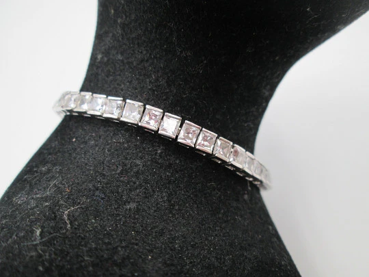 Women's articulated bracelet. 925 sterling silver and zircons. Tab clasp. 1990's