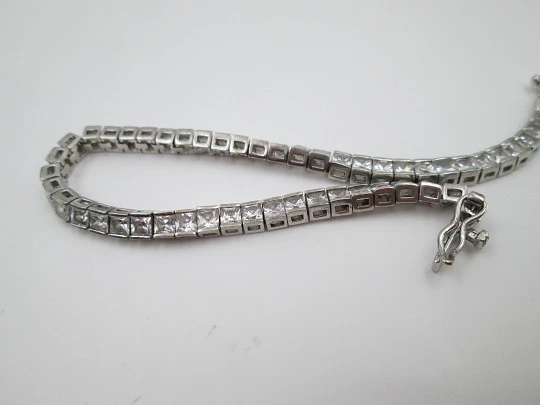 Women's articulated bracelet. 925 sterling silver and zircons. Tab clasp. 1990's