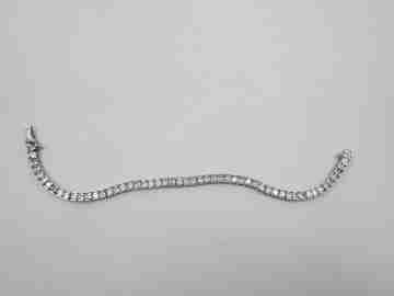 Women's articulated bracelet. 925 sterling silver and zircons. Tab clasp. 1990's