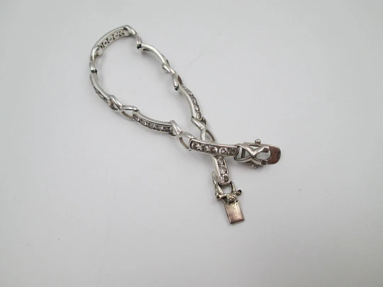 Women's articulated bracelet. Alternating links. Sterling silver & white gems. 1990's