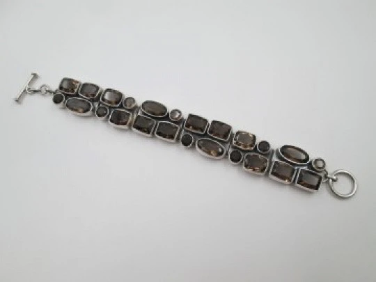 Women's articulated bracelet. Sterling silver 925 thousandths and topazes. 1970's