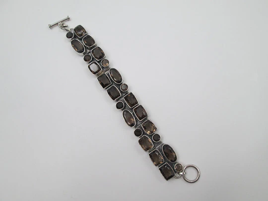 Women's articulated bracelet. Sterling silver 925 thousandths and topazes. 1970's