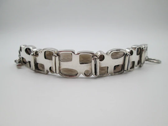 Women's articulated bracelet. Sterling silver 925 thousandths and topazes. 1970's