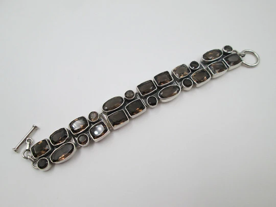 Women's articulated bracelet. Sterling silver 925 thousandths and topazes. 1970's