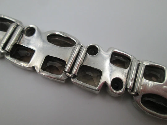 Women's articulated bracelet. Sterling silver 925 thousandths and topazes. 1970's