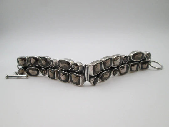 Women's articulated bracelet. Sterling silver 925 thousandths and topazes. 1970's