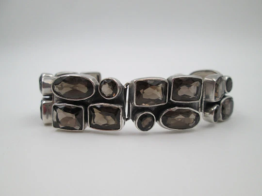 Women's articulated bracelet. Sterling silver 925 thousandths and topazes. 1970's