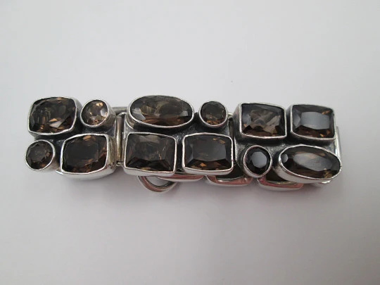 Women's articulated bracelet. Sterling silver 925 thousandths and topazes. 1970's