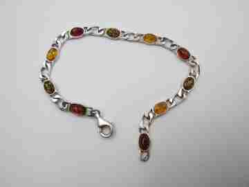 Women's articulated bracelet. Sterling silver & amber color details. 1980's