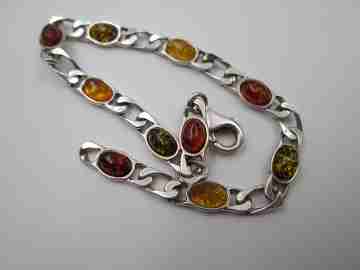 Women's articulated bracelet. Sterling silver & amber color details. 1980's