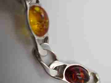 Women's articulated bracelet. Sterling silver & amber color details. 1980's
