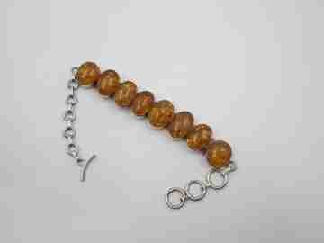 Women's articulated bracelet. Sterling silver & amber. Toggle clasp. 1980's