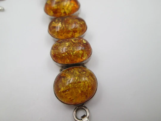 Women's articulated bracelet. Sterling silver & amber. Toggle clasp. 1980's